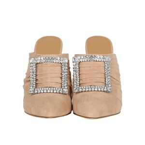 Suede mule heel with rhinestone buckle.